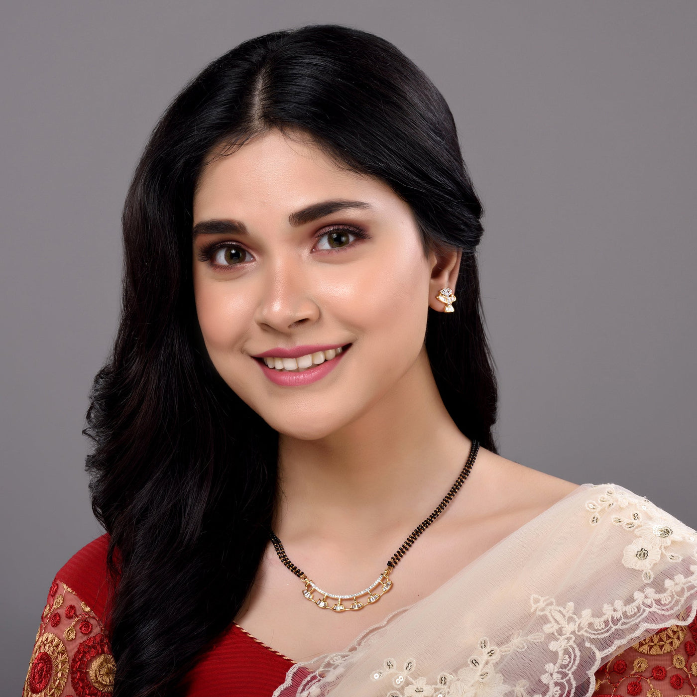 Women's Gold Plated With Black Beads Ad Studded Mangalsutra Pendant With Earrings Set