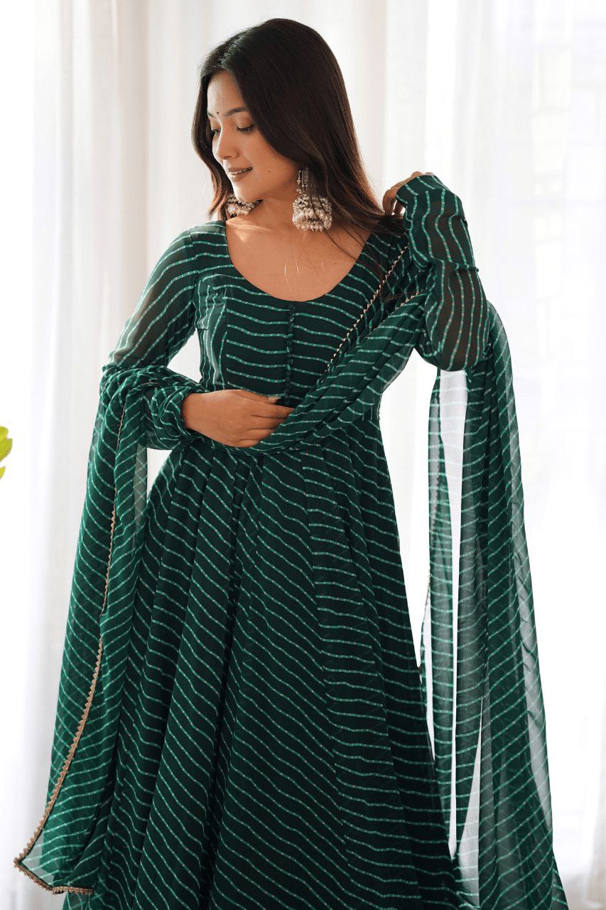 Women's Floral Printed Knee Length Elbow Length Sleeves Round Neck Kurti And Palazzo Set With Net Dupatta