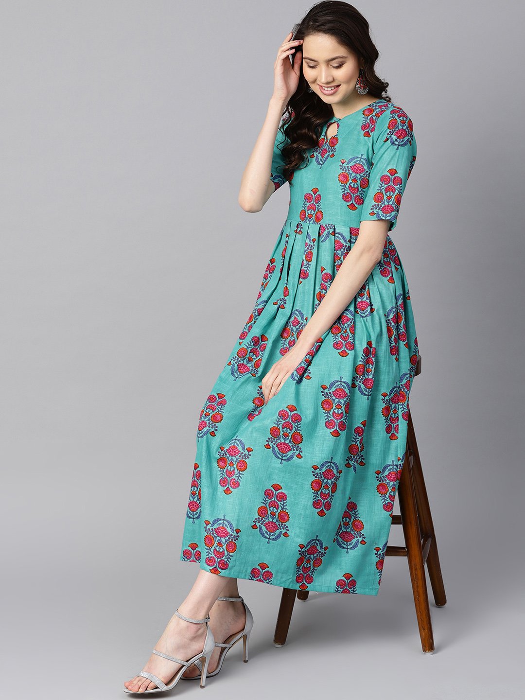 Women's Turqish Blue Color Printed Half Sleeve Pleated Maxi Dress With Deep Back And Tassel Detailing.