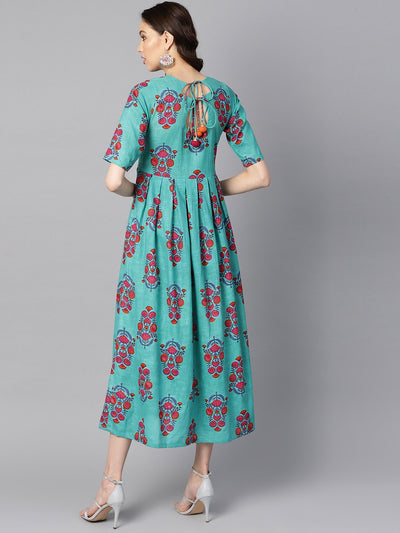 Women's Turqish Blue Color Printed Half Sleeve Pleated Maxi Dress With Deep Back And Tassel Detailing.