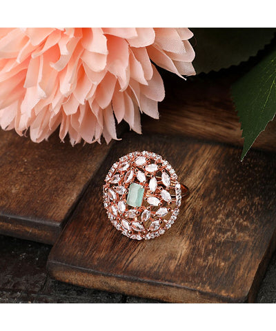 Women's Rose Gold plated American Diamond Studded Floral shaped with Blue colored Ring