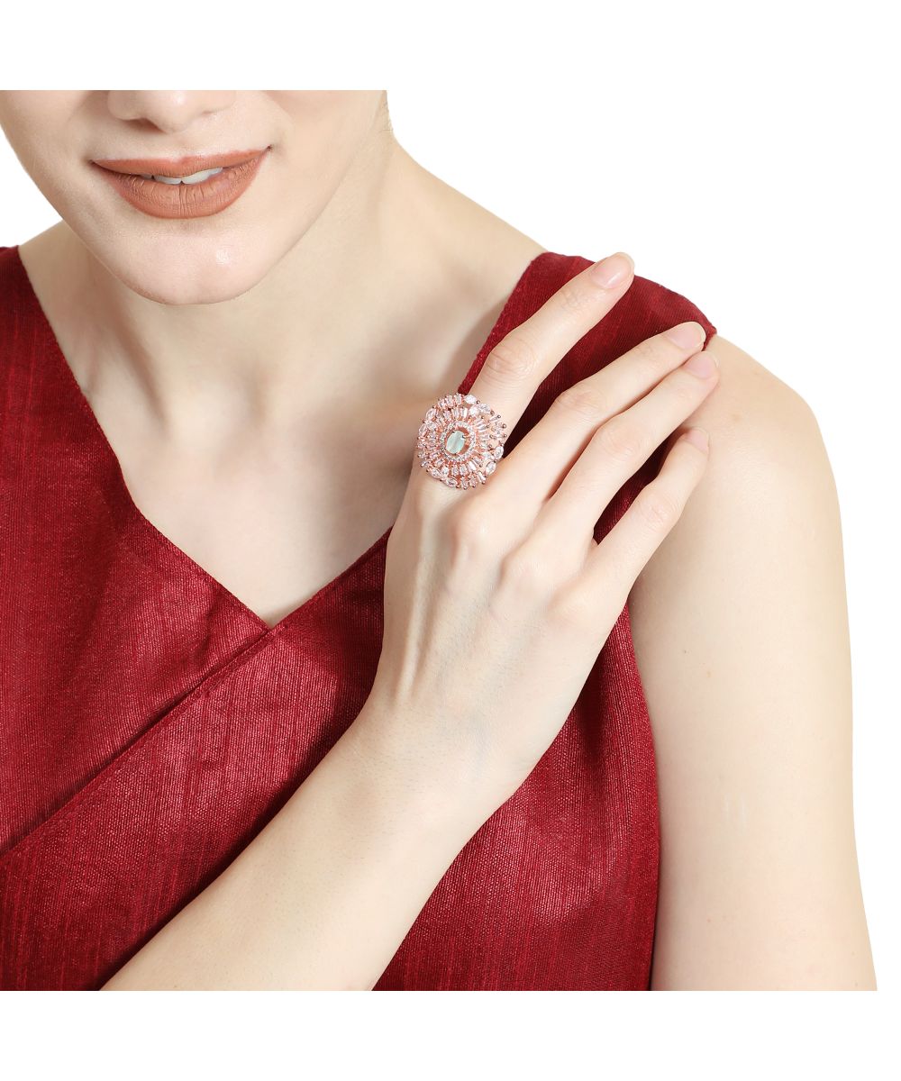 Women's Rose Gold plated American Diamond Studded Floral shaped with Blue colored Ring